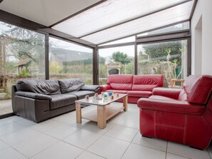 Couch, Furniture, Property, Plant, Living Room, Shade, Architecture, Interior Design, Floor, Flooring