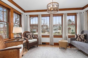 The sun room at the front of the house is a great place to enjoy your morning cup of coffee.