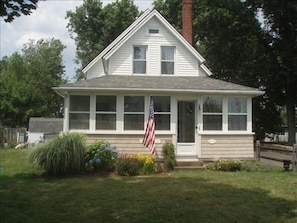 This 1903 charming cottage has been restored to original with modern amenities