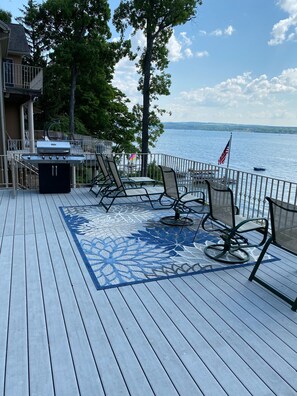 Beautiful deck view and propane grill. 