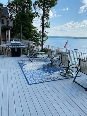 Beautiful deck view and propane grill. 