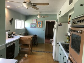 Kitchen looking down hallway to bedrooms.