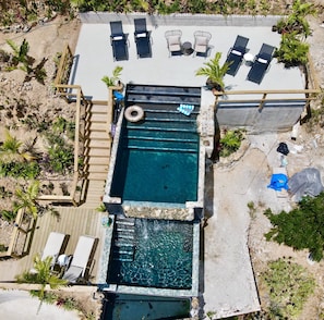 the pools in the early days, before landscaping and sun shade
