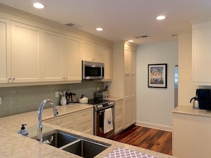 Renovated well stocked kitchen so you can cook "at home" during your vacation!