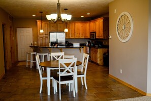 View of dining and kitchen from living room 