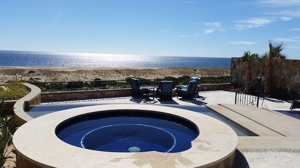 Enjoy family time in the hot tub (next to the pool).