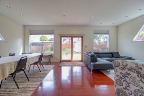 Dinning room/ entertainment room with a kitchen bar