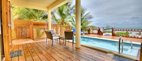 Private pool & deck off lower level.