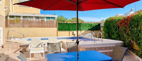 Shaded Dining area next to the pool