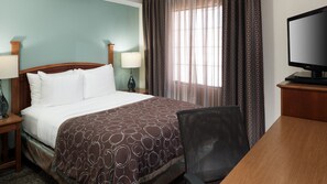 Drift to sleep in this plush bed.