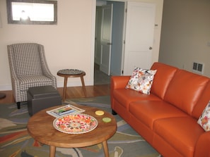 A comfortable living room area with a flat screen television.
