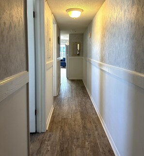 Hallway to Main Living & Bathroom