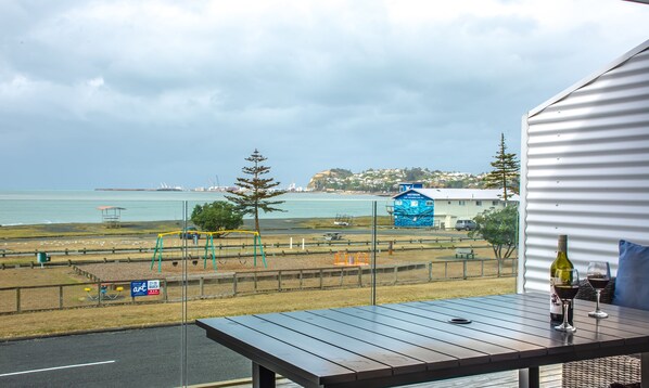 Welcome to our house, surf life saving club in the background . 


