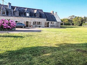 Sky, Plant, Property, Building, Window, Flower, House, Wheel, Land Lot, Natural Landscape