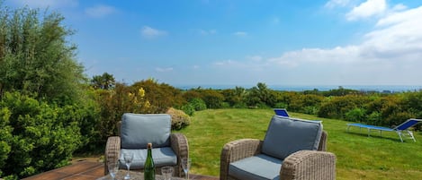 Cloud, Sky, Furniture, Table, Plant, Property, Chair, Outdoor Furniture, Natural Landscape