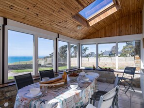 Property, Furniture, Table, Sky, Chair, Window, Shade, Interior Design, Architecture, Plant