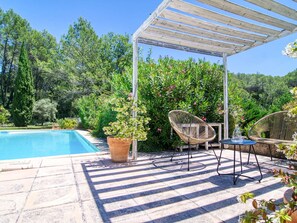 Plant, Property, Water, Sky, Shade, Outdoor Furniture, Grass, Leisure, Swimming Pool, Residential Area