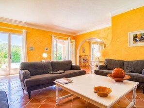 Furniture, Couch, Property, Table, Plant, Comfort, Living Room, Wood, Orange, Studio Couch