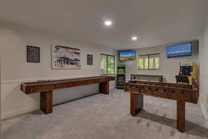 Recreation area with foosball, shuffle board, and arcades
