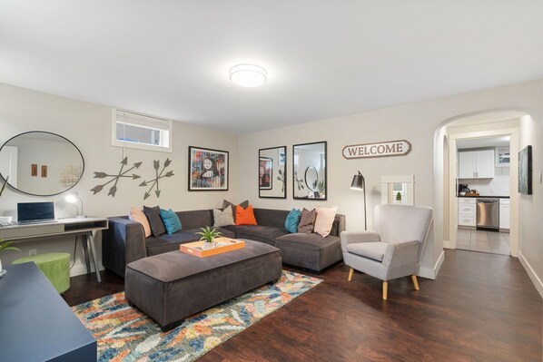 Living Area with Smart TV and Laptop-friendly Workspace
