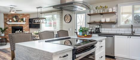 Newly remodeled, fully-stocked kitchen in the center of everything