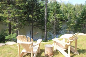 Relax in backyard while overlooking river