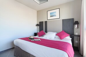 Drift to sleep in the comfortable bed after a wonderful day outside.