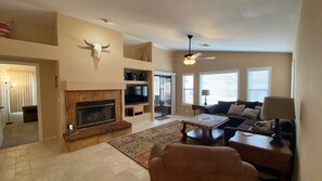 well appointed living room with beautiful fireplace