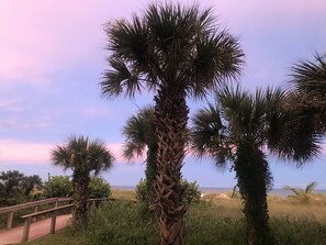 Beach walkway at sunset