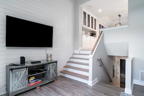 The 2nd level great room with large Smart TV