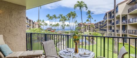 Dine al fresco on your private lanai with endless tropical views and the Pacific