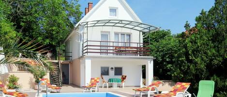 Building, Sky, Plant, Furniture, Azure, Swimming Pool, Chair, House, Tree, Residential Area