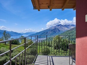 Sky, Cloud, Daytime, Property, Mountain, Ecoregion, Wood, Shade, Architecture, Highland