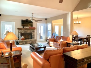 Living space on main floor with screened porch and deck accessibility.