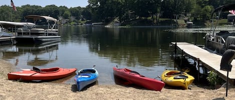 Kayaks ready for fun on the sandy beach 