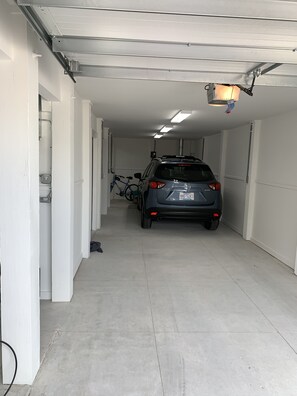 Can park 2 medium size cars in garage and 2cars in designated parking spaces