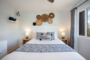 Relax in your very own boho modern queen bed, located on the 1st floor.