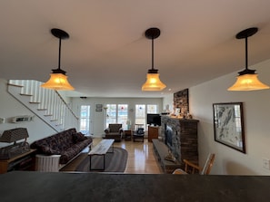 Living room on main floor from kitchen.