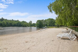 Unwind and soak up the sun on this picturesque sandy shoreline