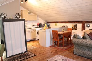 Fully equipped galley kitchen and small dining area