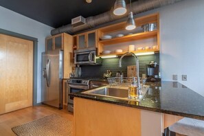Fully stocked kitchen with all the essentials to prepare meals.