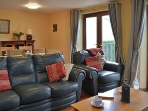 Living room with dining area | Orchard Cottage - Orchard Farm, Bideford