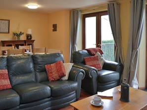 Living room with dining area | Orchard Cottage - Orchard Farm, Bideford