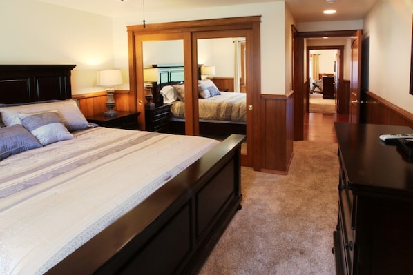 Two large well-appointed bedrooms are separated by  wonderful bathroom.