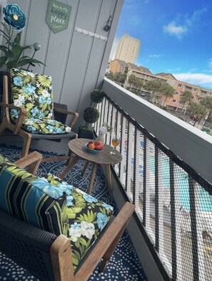 Pool View Patio with Nautical Lounge furniture and frequently replaced cushions