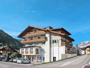 Sky, Building, Plant, Window, Mountain, House, Urban Design, Cloud, Wheel