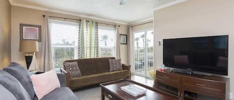 Our cozy living corner feels twice the size when the morning light streams in through the patio doors.