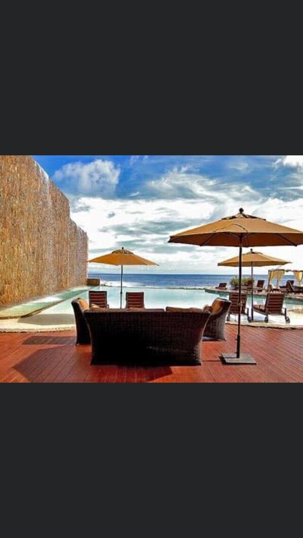 Steps away u have this beautiful pool overlooking the ocean