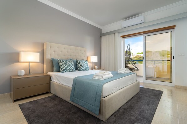 Spacious bedroom with king size bed