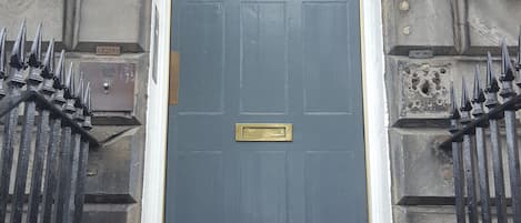 secure door to apartment on Queen St